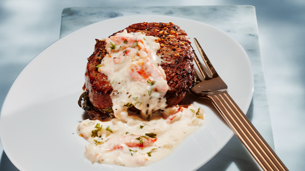 CAST IRON PAN-SEARED TENDERLOIN WITH KING CRAB PARMESAN CREAM SAUCE