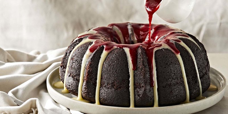CHOCOLATE BUNDT CAKE WITH WHITE CHOCOLATE AND RASPBERRY DRIZZLE